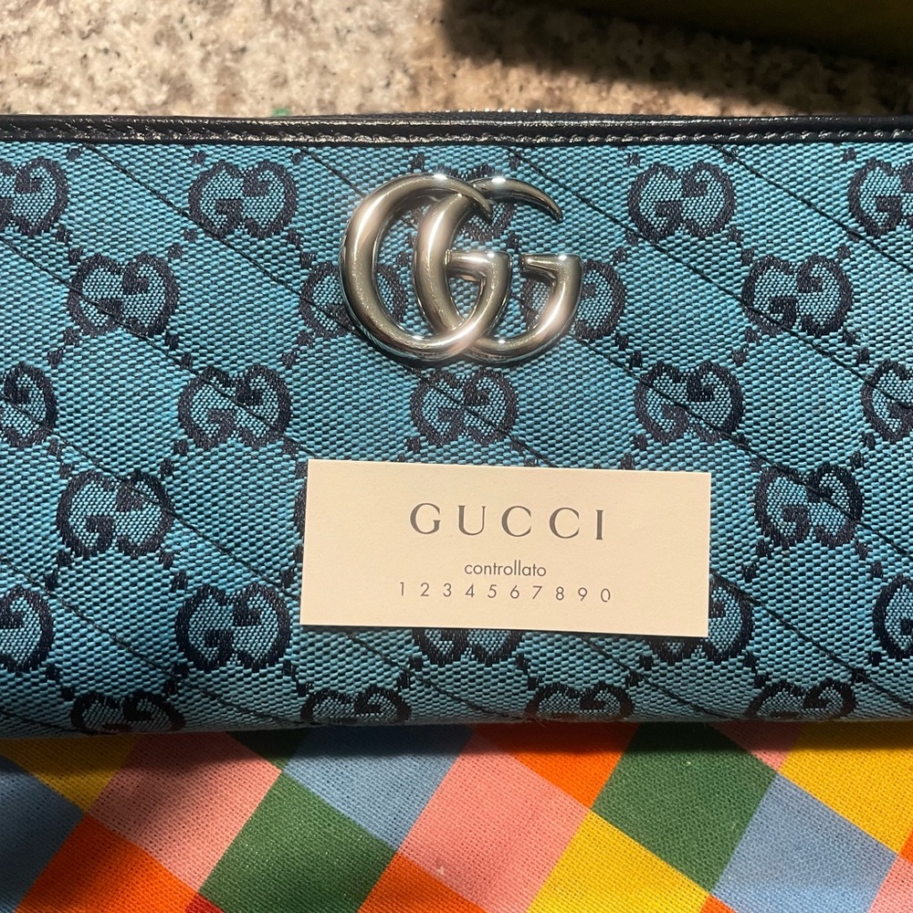 Authentic Gucci multicolored/blue zipper wallet